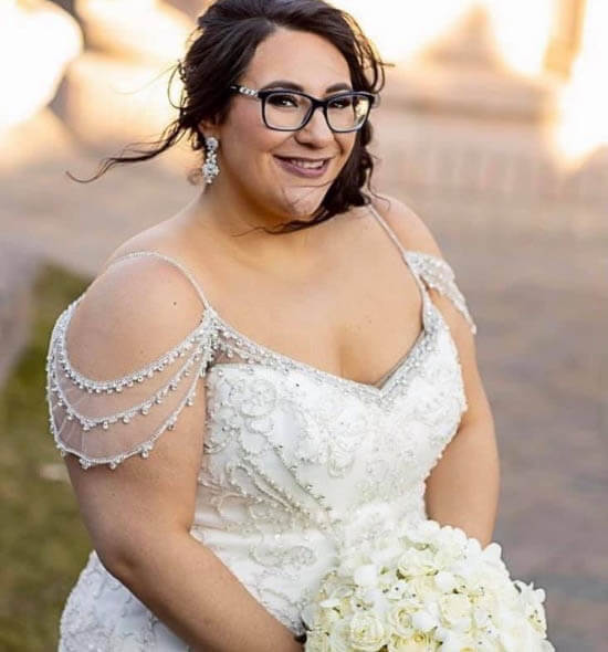 Model wearing a white gown